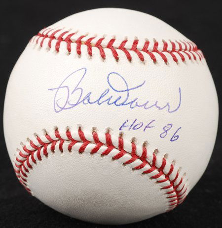 Bobby Doerr Signed "HOF 86" Baseball: Rawlings official Major League baseball (Selig) signed and inscribed across the sweet spot in blue ballpoint pen, "Bobby Doerr, HOF 86." In fine condition. COAs from Global Authentication and Tri-Star