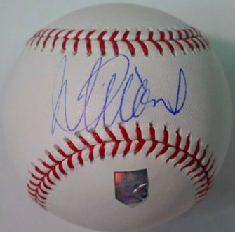 Ichiro Suzuki Signed OML Baseball (Rare!): Official Major League (Selig) baseball boldly signed across the sweetspot in blue ballpoint pen ("10"). In excellent condition. Ichiro's official authentication hologram is affixed to the side panel d