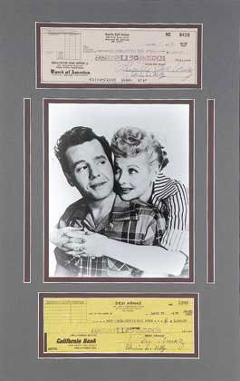 Lucy & Desi Signed Checks Display: 12" x 20" double matted display featuring two signed bank checks from television's most beloved couple of all-time. Dated between 1957 and 1959, both checks are drawn on Lucy and Desi's personal accou