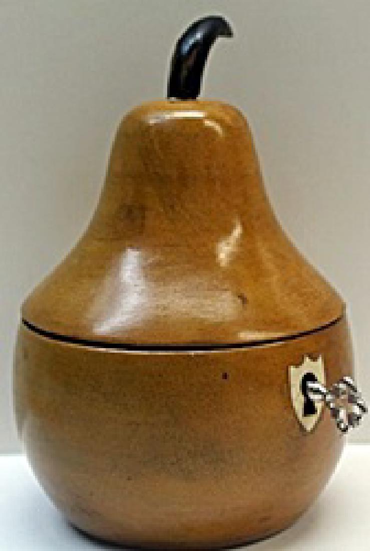 Hand Carved Antique Wood Pear Lockbox w/ Key: Hand Carved, Antique Wood, Pear Shaped, Lockbox with Skeleton Key, Gilded metalwork hinges, and mechanically working Lock, Size Approx. 5 1/2" x 3 1/2" x 3 1/2" in.
