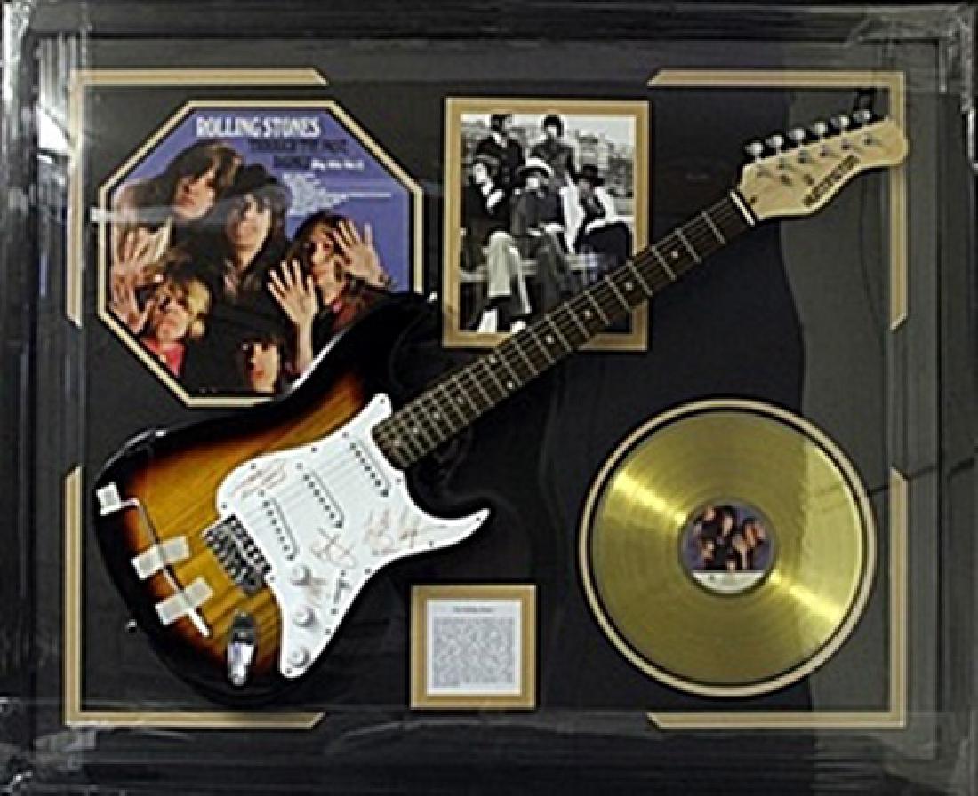 Memorabilia "The Rolling Stones" Autographed Guitar: Memorabilia "The Rolling Stones", Autographed Guitar with Gold Record, Album Cover, Photograph, and Small Biography. Size Approx.. 35 x 42 In.