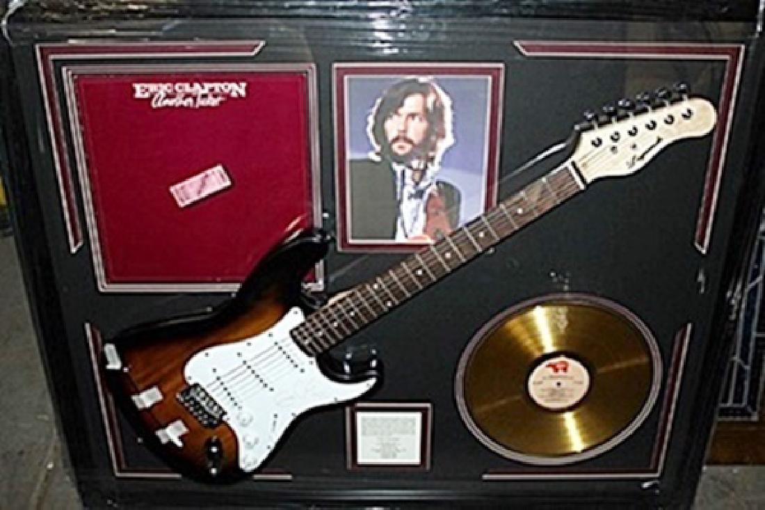 Eric Clapton Signed Guitar & Memorabilia: Guitar with Laser Matted Autograph. Each Item is Made one of a kind in the US to order and may vary slightly from image.