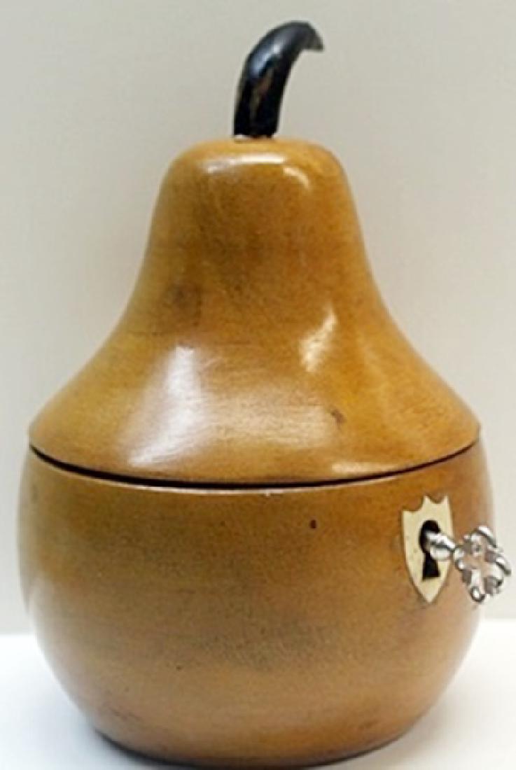 Hand Carved Antique Wood Pear Lockbox w/ Key: Hand Carved, Antique Wood, Pear Shaped, Lockbox with Skeleton Key, Gilded metalwork hinges, and mechanically working Lock, Size Approx. 5 1/2" x 3 1/2" x 3 1/2" in.