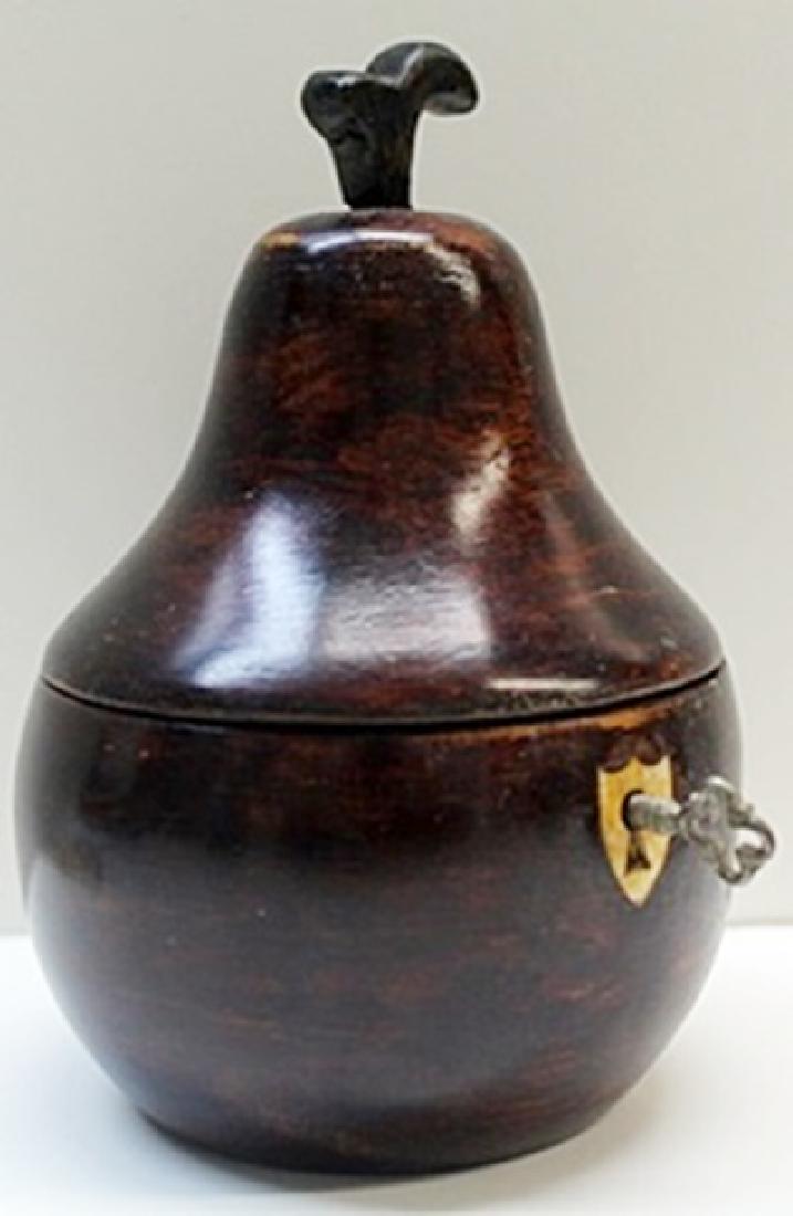 Hand Carved Antique Dark Wood Pear Lockbox w/Key: Hand Carved, Antique Dark Wood, Pear Shaped, Lockbox with Skeleton Key, Gilded metalwork hinges, and mechanically working Lock, Size Approx. 5 1/2" x 3 1/2" x 3 1/2" in.