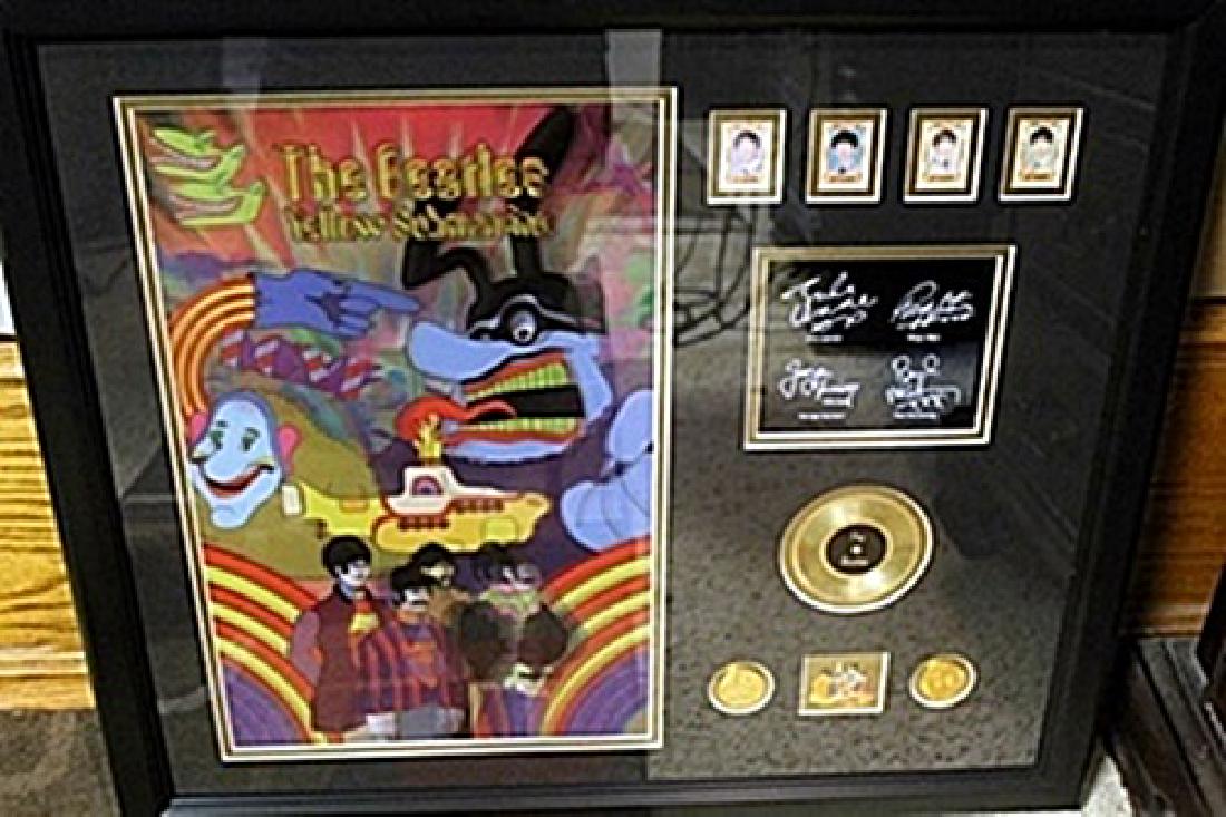 Holographic picture with gold record The Beatles: Framed holographic Picture with Photos and Gold Record. Each Item is Made one of a kind in the US to order and may vary slightly from image.