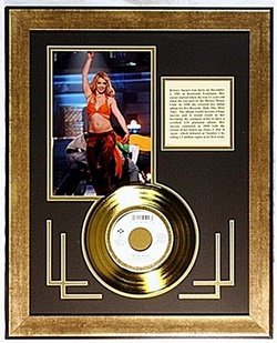 Britney Spears Giclee with Gold Record: "Britney Spears " Giclee with Gold Record "Baby one more time", also with Biography, comes in Beautiful custom matt & frame, approx dimension 21"x17".