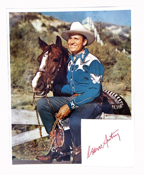 Gene Autry Stetson advertising poster, 27 ½" x 40": Gene Autry Stetson advertising poster, 27 ½" x 40", with original photo and autograph by Gene.