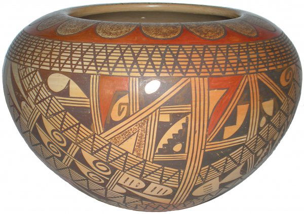 Rondina Huma Hopi-Tewa Vase Indian Native America: Hopi-Tewa vase circa 1980's created by pottery master, Rondina Huma. A self-taught potter best known for her intricate fine-line work and Sikyatki designs, Huma, crafts her pieces using the traditiona