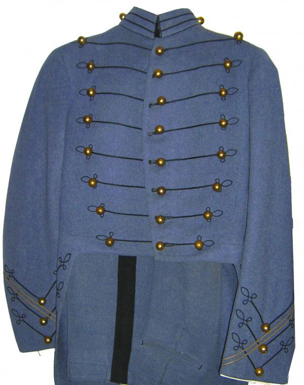 U.S. Cadet Uniform West Point Military Academy: 1943 West Point cadet uniform from Colonel James Hildebrandt. Includes coat and pants with brass-ball buttons. Tag reads ''No. 634 / Date: 8-12-43 / Cadet Store West Point / Name: Hildebrandt JE / Mak