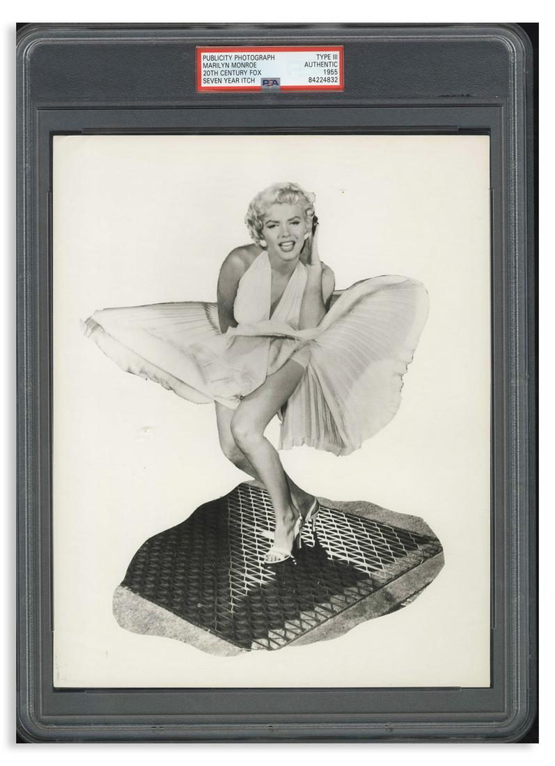 Marilyn Monroe 7 Year Itch 8x10' Photo PSA T3: Marilyn Monroe photo from ''The Seven Year Itch'', showing Marilyn in her white dress over the subway grate, from one of the most famous movie scenes of all time. Photo by Sam Shaw measures 8'' x 10''