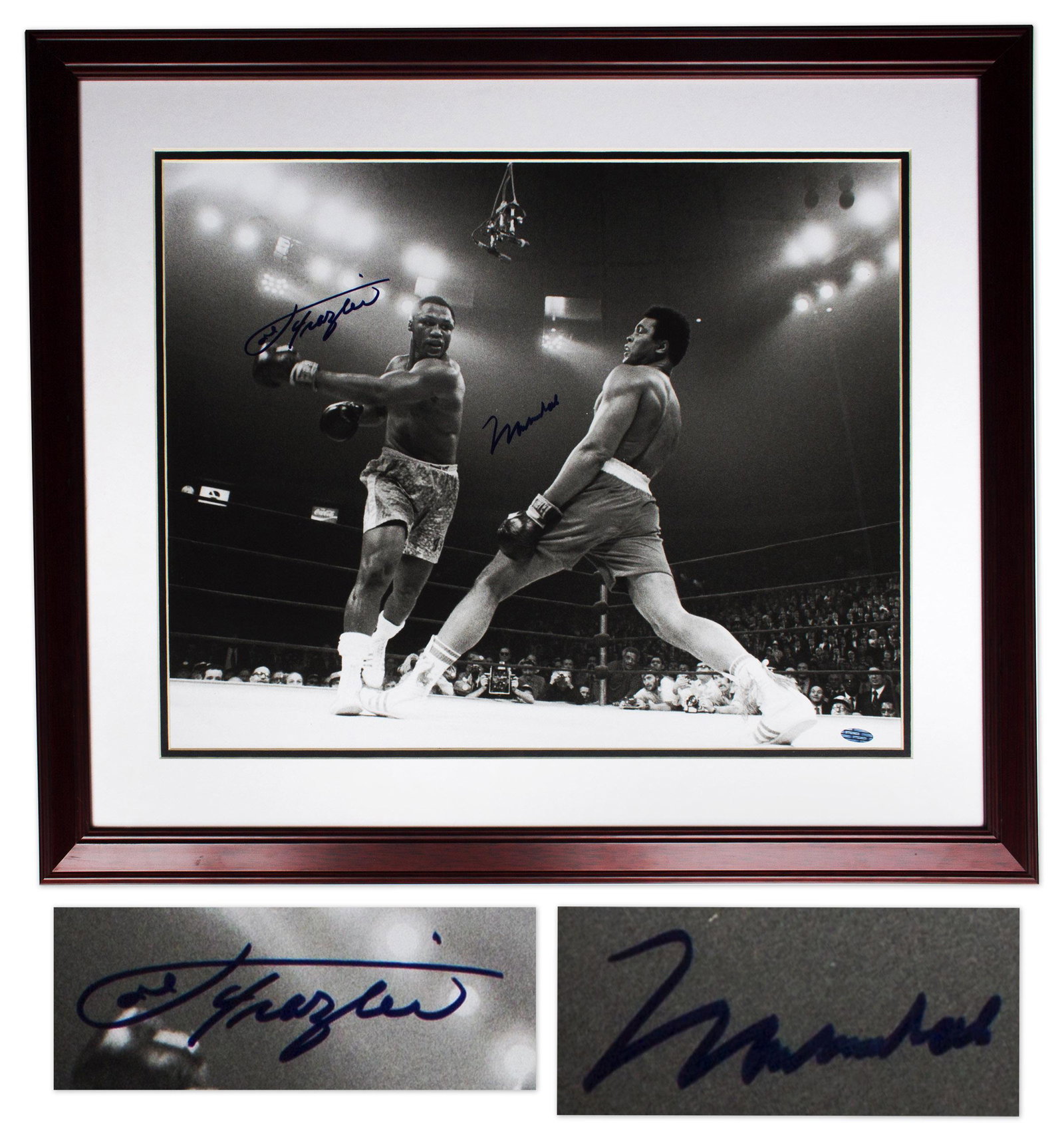 Muhammad Ali & Joe Frazier Signed 20x16 Photo: Fantastic photo signed by Muhammad Ali and Joe Frazier as they battle against each other in the ''Fight of the Century'' on 8 March 1971 at Madison Square Garden. Photo shows Ali dodging Frazier's leg