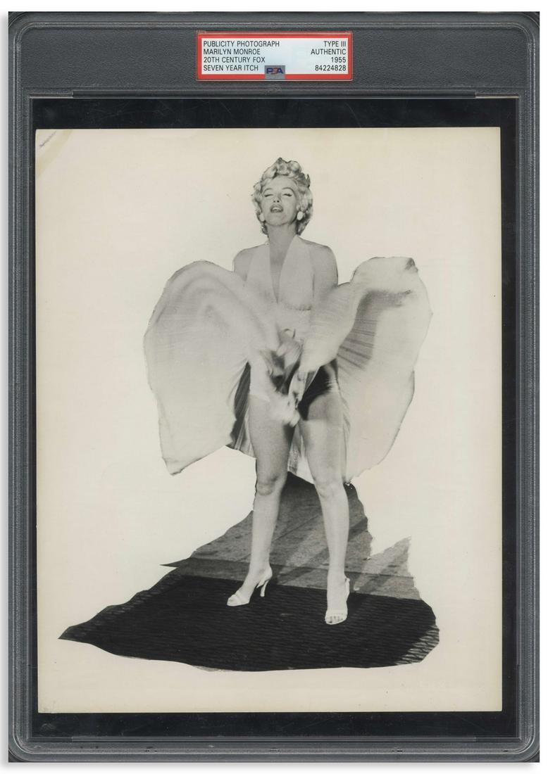 Marilyn Monroe ''Seven Year Itch'' 8x10 From the Famous: Marilyn Monroe photo from ''The Seven Year Itch'', showing Marilyn in her white dress over the subway grate, from one of the most famous movie scenes of all time. Photo by Sam Shaw measures 8'' x 10''