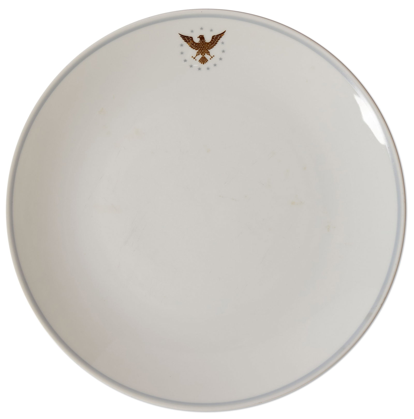John F. Kennedy Presidential China: Scarce china plate used on John F. Kennedy's Convair 240 plane ''Caroline'', the plane credited with providing JFK the narrow margin of victory in the 1960 Presidential election by allowing him to qui