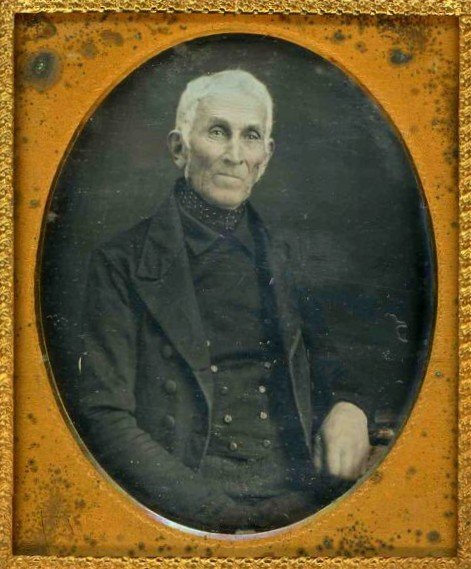 Sixth Plate Daguerreotype Gentlemen Ascot Case: Interesting sixth-plate daguerreotype of a white-haired man dressed in a double-breasted suit and a polka-dot ascot. Frame slightly tarnished and the case is split and slightly worn. Housed in a leath