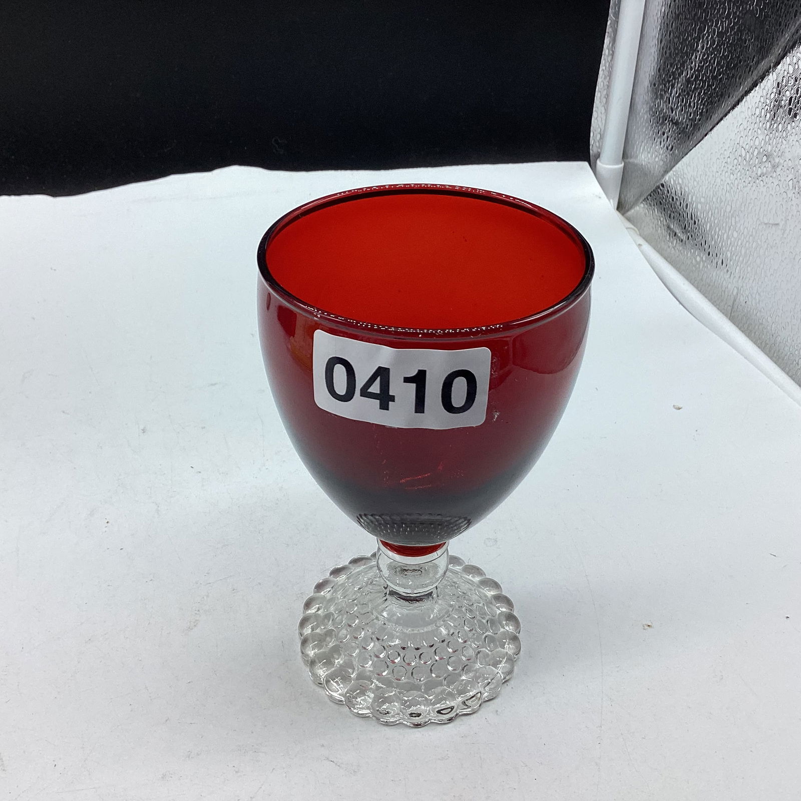 1950'S RED WATER GOBLET W/BOOPIE FEET: 5 1/2" TALL GOOD SHAPE