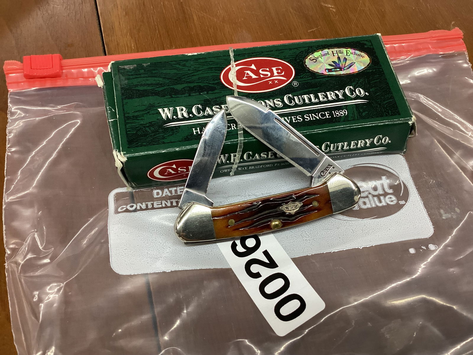 case xx 2008 dark amber bone baby butterbean: with correct box never used or carried