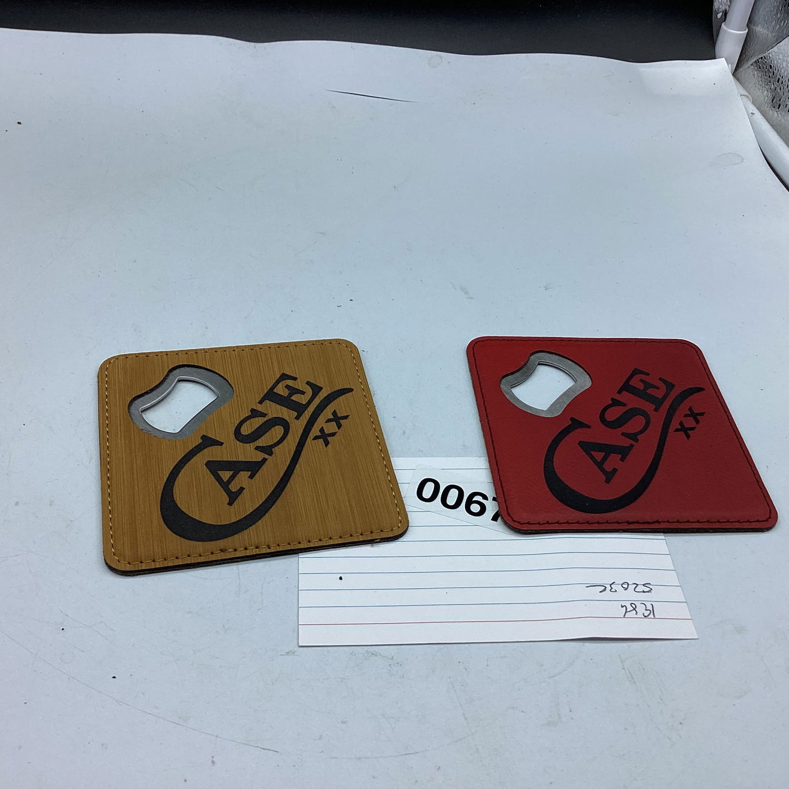 case xx coasters with bottle opner: lot of 2