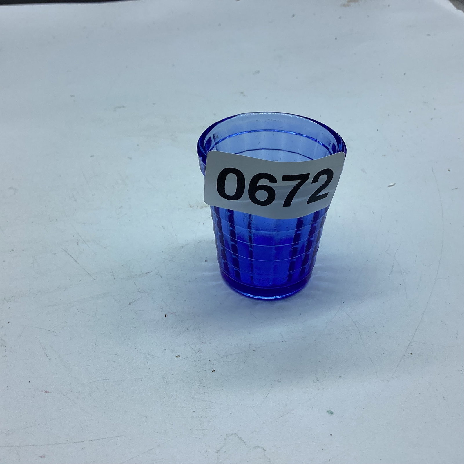 BLUE DEPRESSION SHOT GLASS: 2" TALL GOOD SHAPE