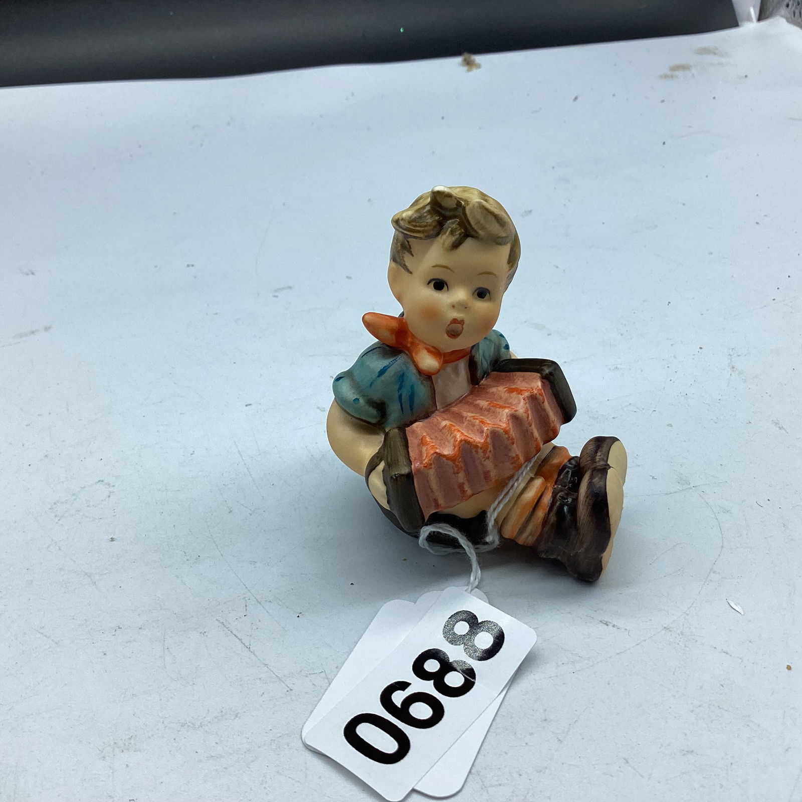 HUMMEL FIGURINE ACCORDIAN BOY: 3" TALL GOOD SHAPE