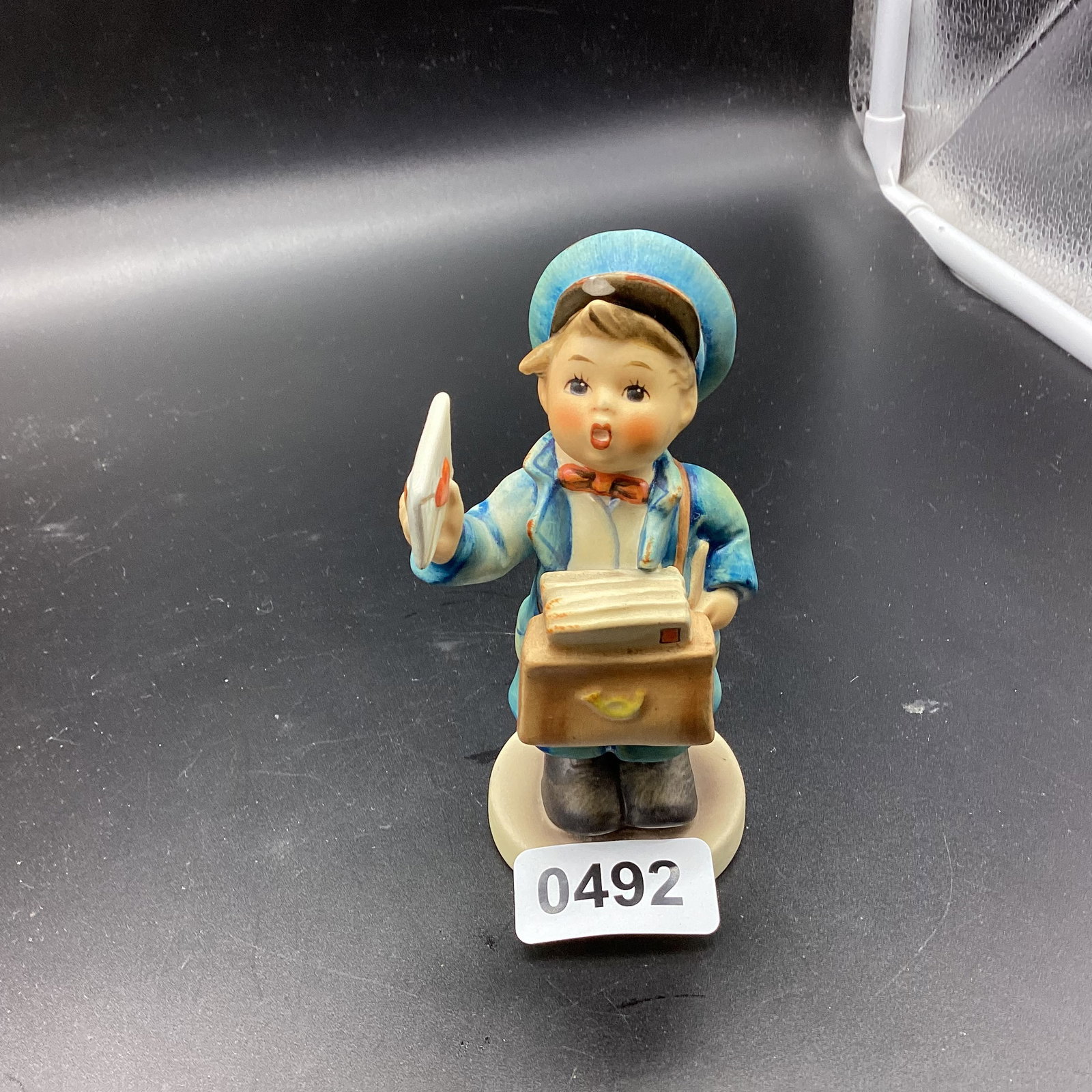 GOEBEL HUMMEL FIGURINE POSTMAN #119 GERMANY FIGURINE: 4 3/4" TALL CHIP ON HAT OTHER WISE GOOD