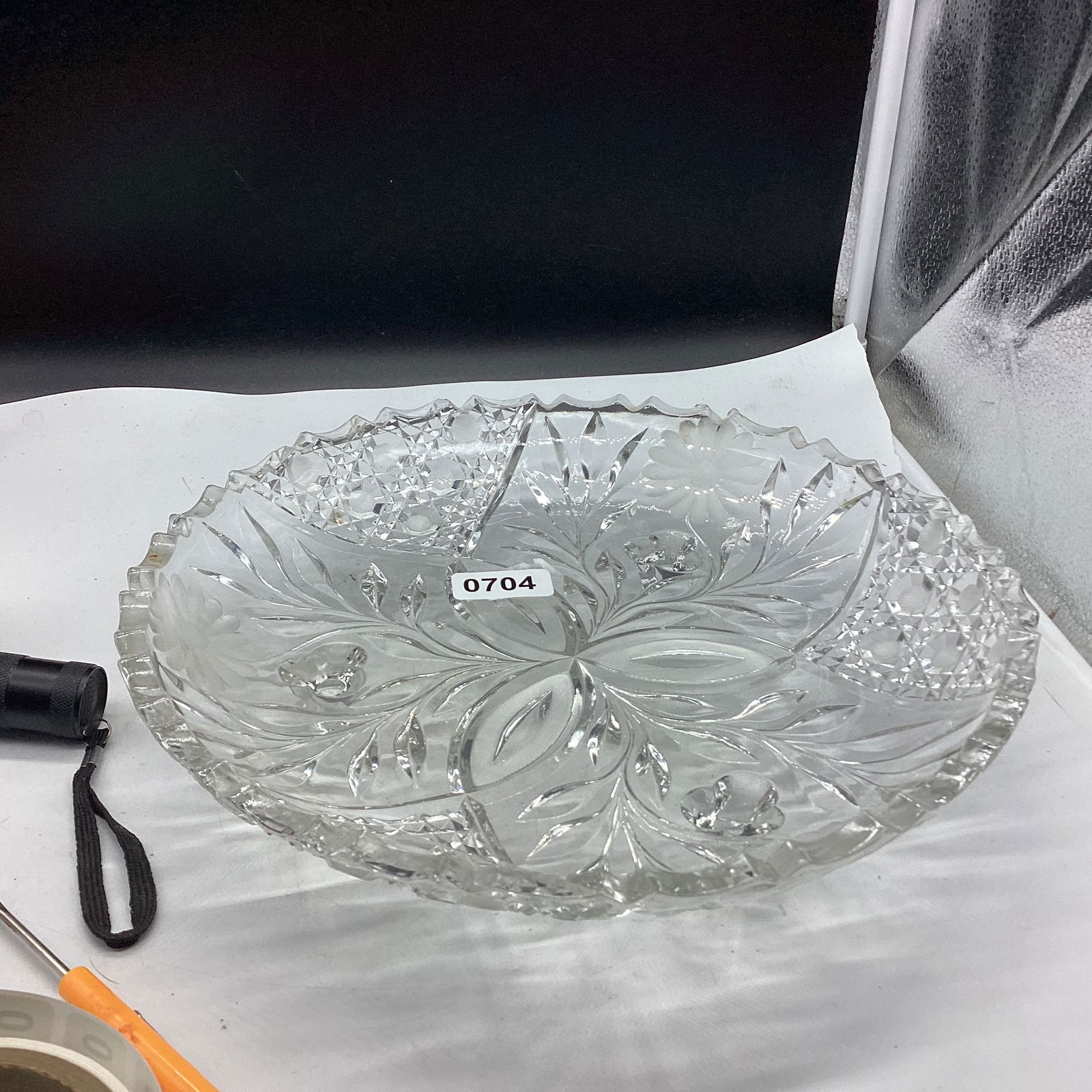 FLOWER CUT GLASS FOUR FOOTED BOWL (1 of 2)
