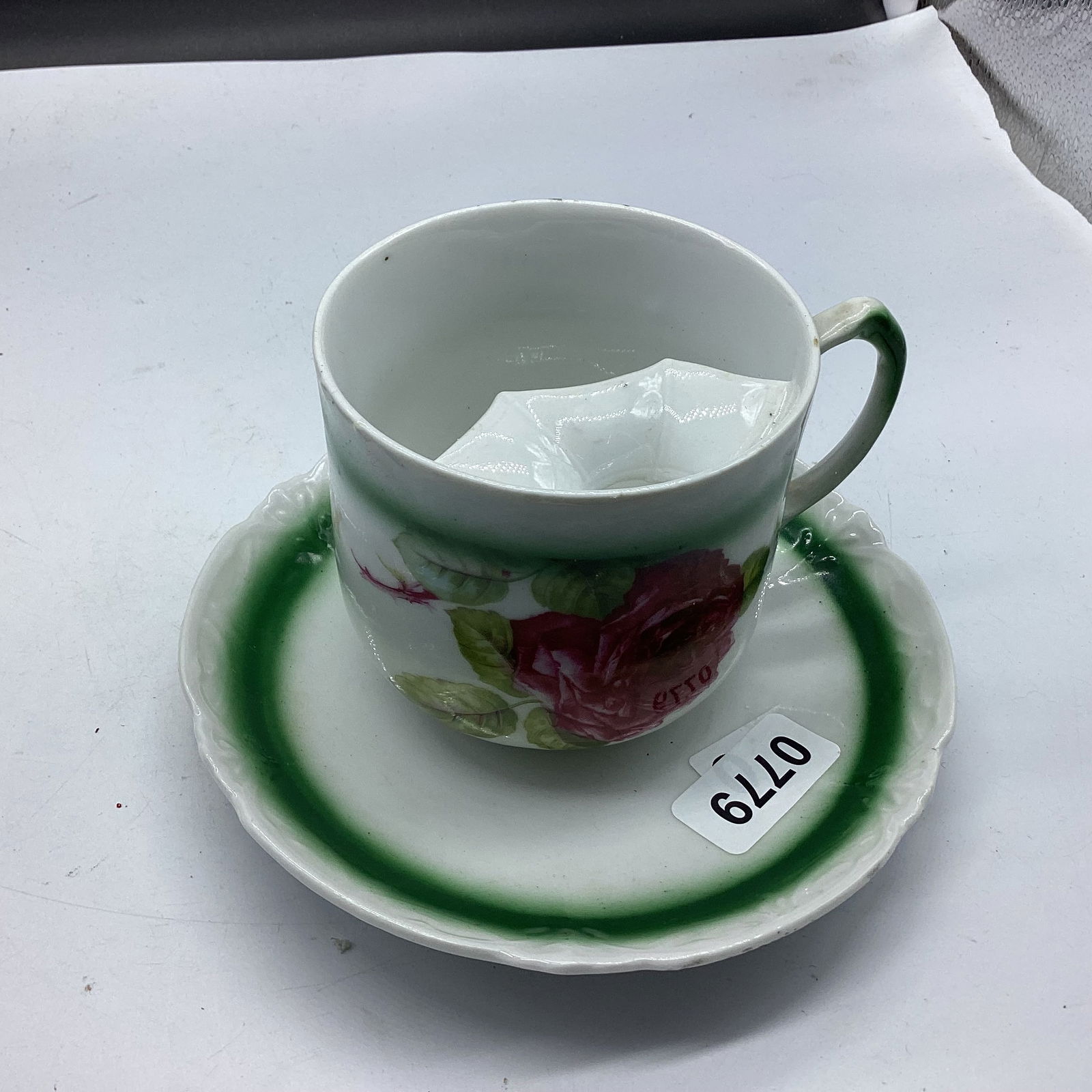 PORCELIAN MUSTACHE CUP & SAUCER (1 of 1)