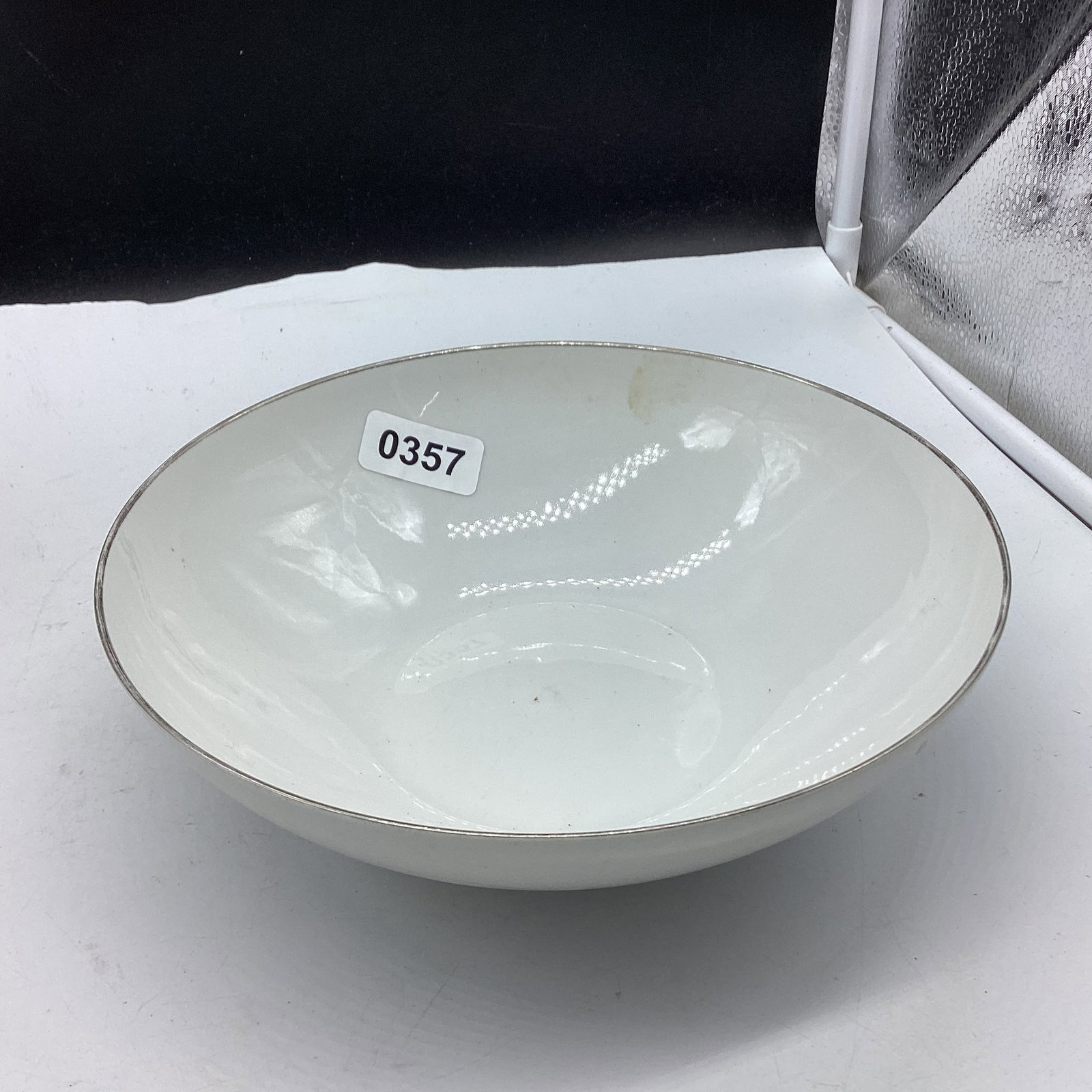 SILVER TRIMED PORCELIAN BOWL MADE IN GERMAY: 8 1/2" WIDE GOOD SHAPE