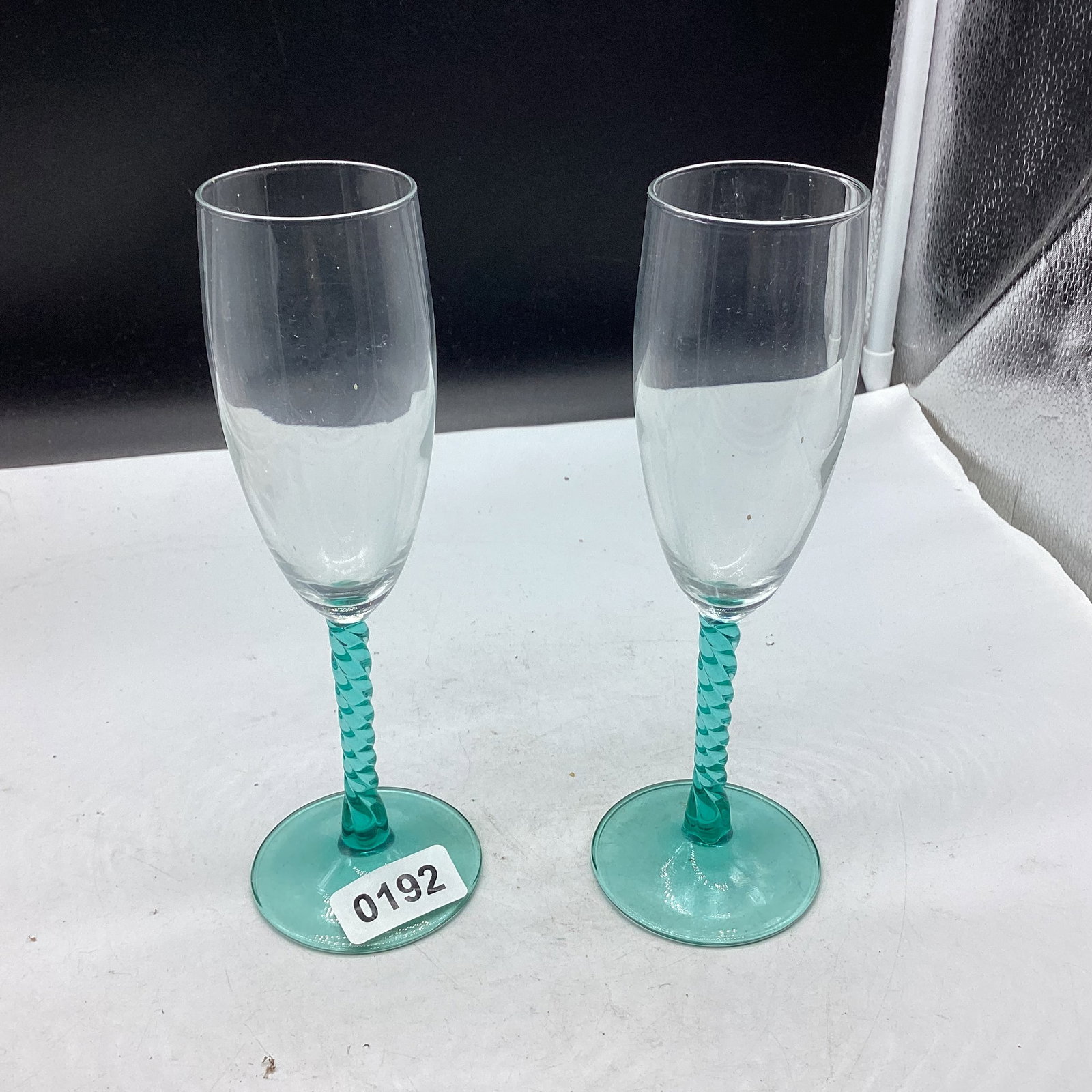 2 TWISTED TEAL CHAMPAGNE WINE GLASSES: 8" TALL GOOD SHAPE