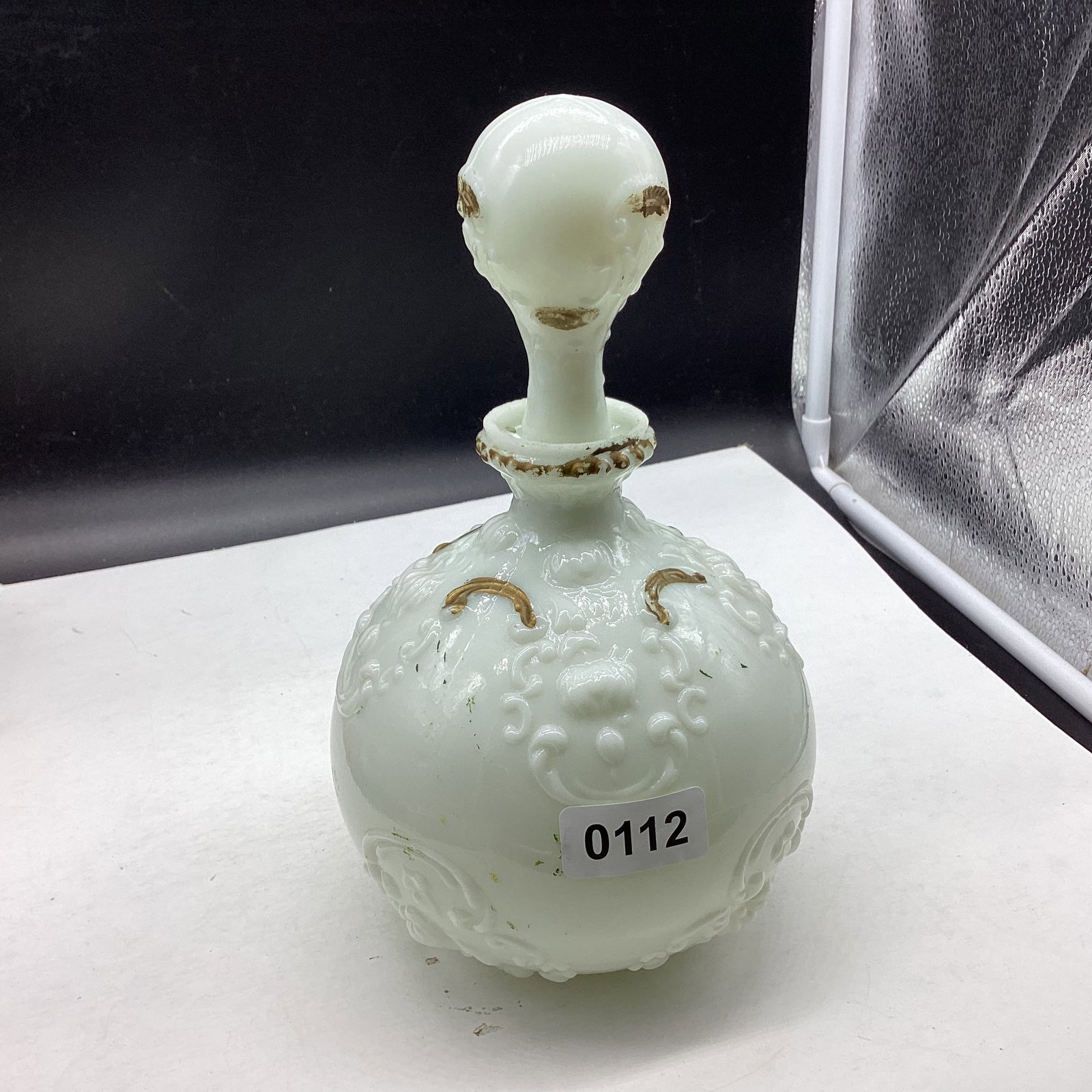 VINTAGE MILK GLASS EMBOSSED BARBER PERFUNE DECANTER: 9 1/2" TALL GOOD SHAPE