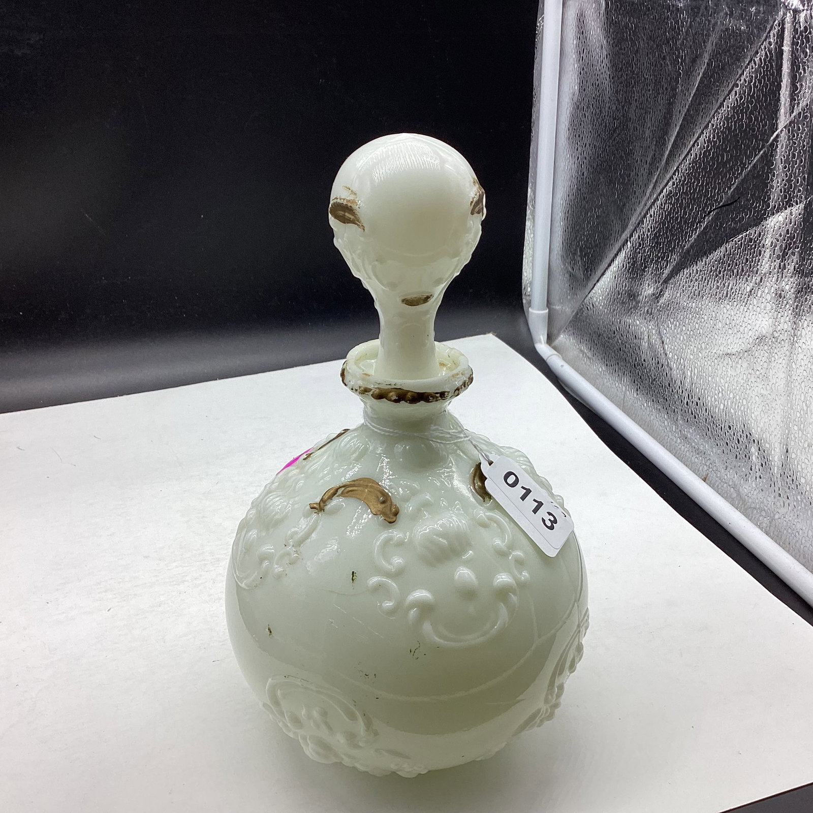 VINTAGE MILK GLASS EMBOSSED BARBER PERFUNE DECANTER: 9 1/2" TALL BEEN REPAIRED