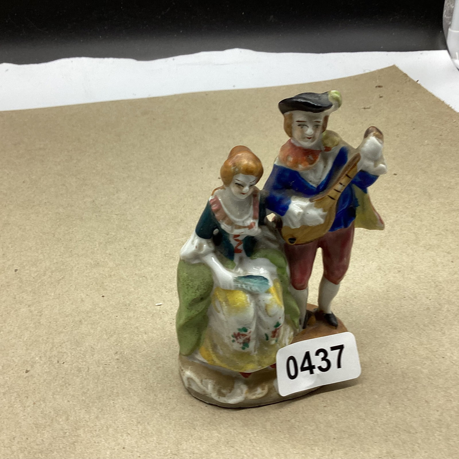 PORCELIAN OCCUPIED JAPAN FIGURINE: 4 1/2" TALL GOOD SHAPE