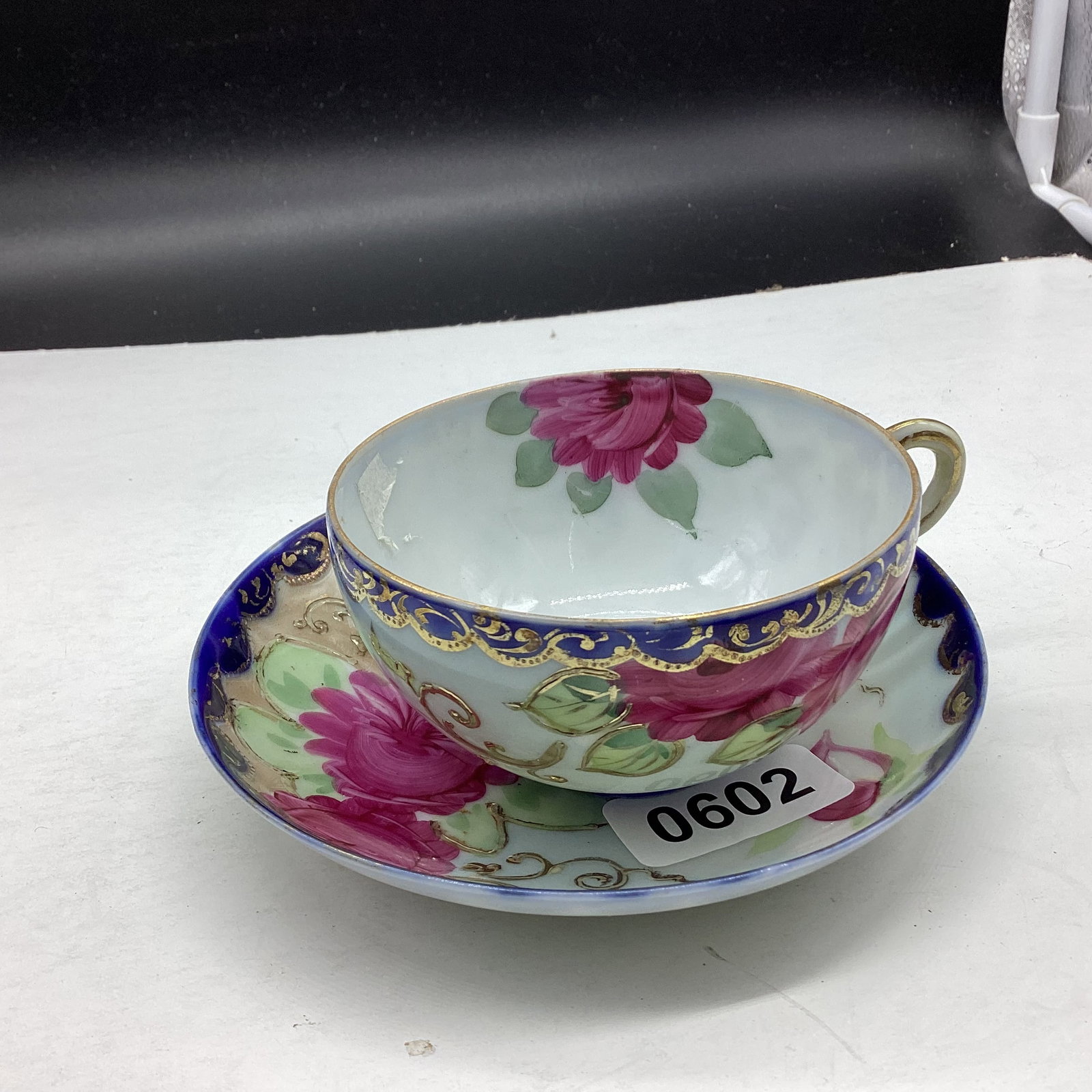 PORCELIAN CUP & SAUCER: GOOD SHAPE
