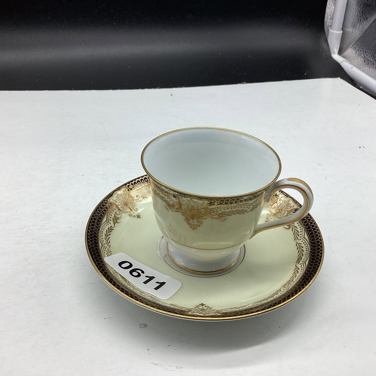 PORCELIAN DEMITASSIE CUP & SAUCER: GOOD SHAPE