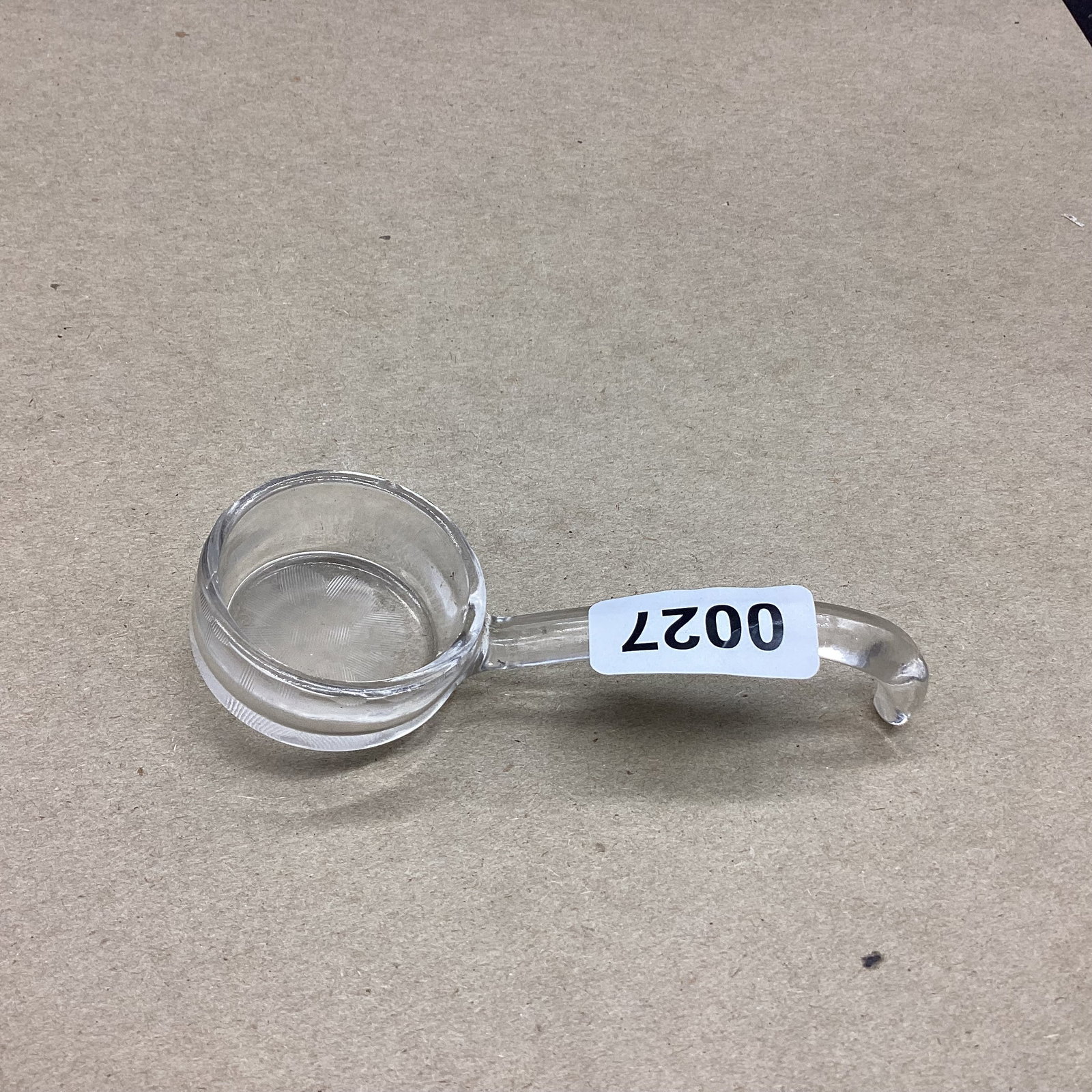 CRYSTAL SAUCE LADLE W/FLOWER DESIGN IN BOTTOM: 5" LONG GOOD SHAPE