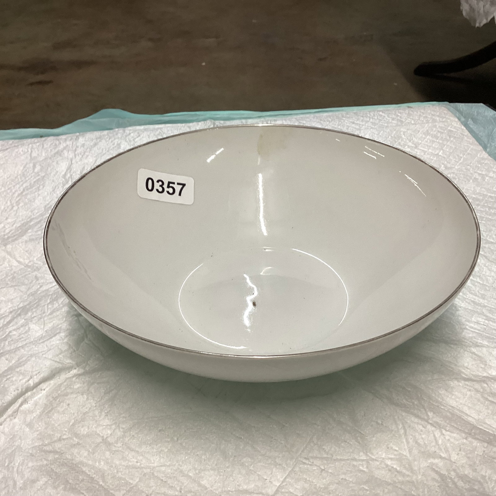 SILVER TRIMED PORCELIAN BOWL MADE IN GERMAY: 8 1/2" WIDE GOOD SHAPE