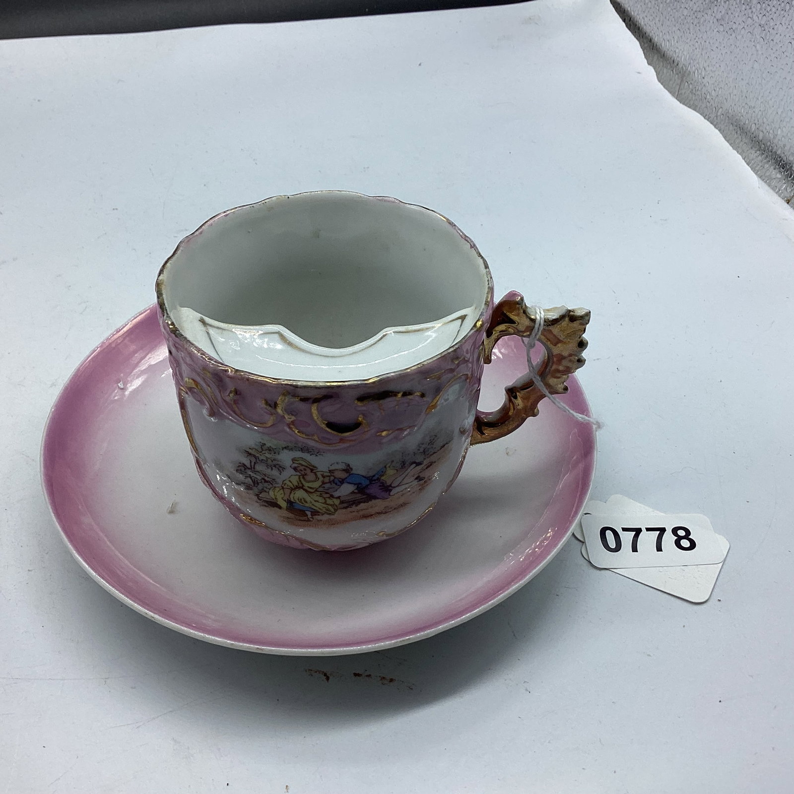 PORCELIAN MUSTACHE CUP & SAUCER: GOOD SHAPE