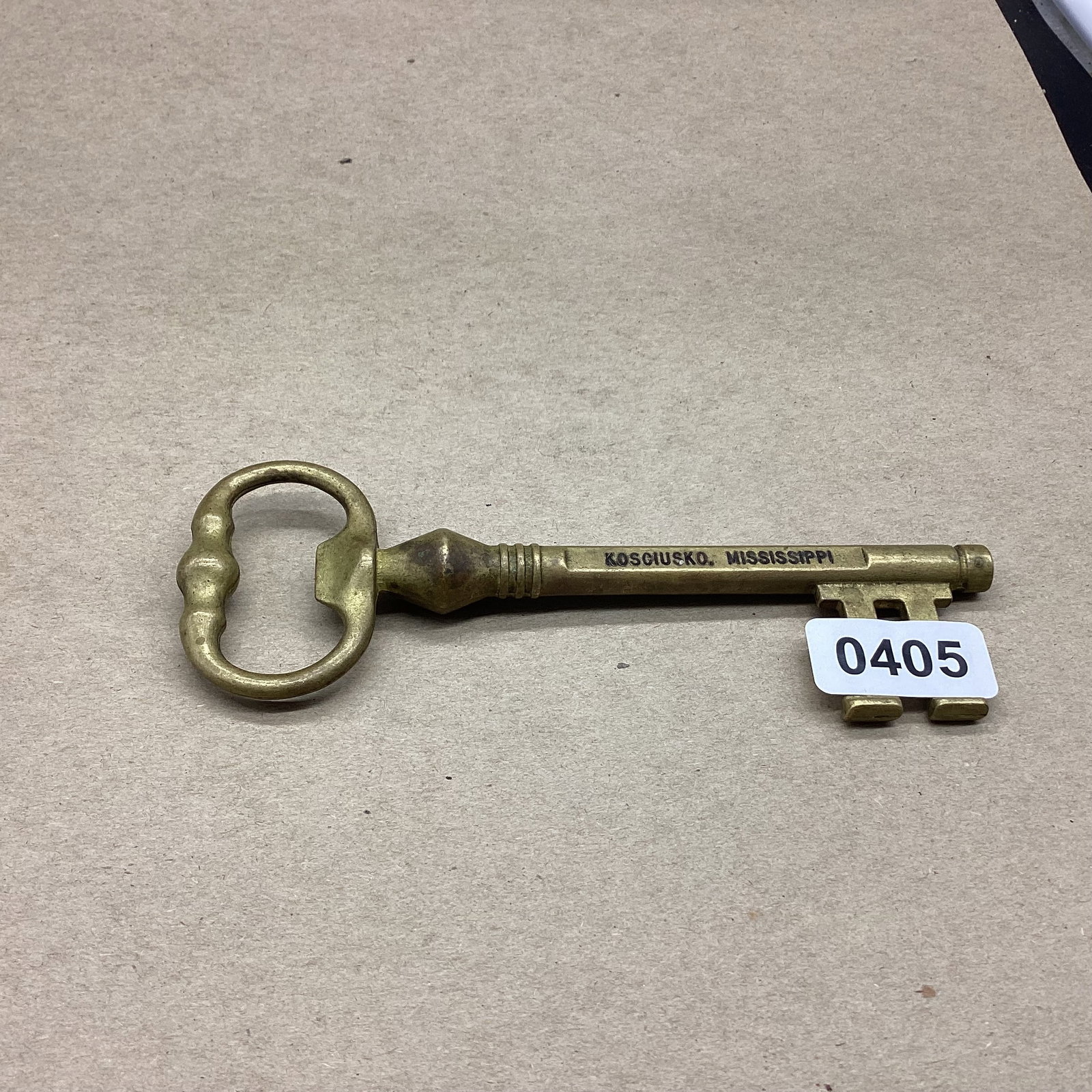 VINTAGE HAEAVY BRASS KEY ADVERTISE KOSCIUSKO, MS AND BOTTLE OPENER: 7" LONG GOOD SHAPE