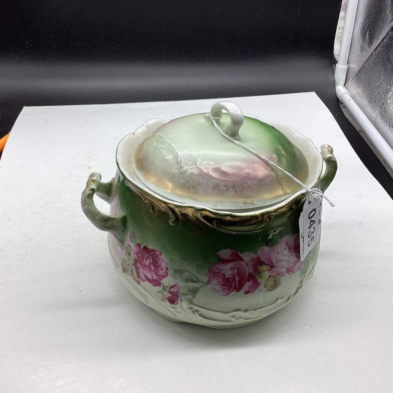 PORCELIAN HAND PAINTED BISCUIT JAR MADE IN GERMANY: 5" T X 7" W GOOD SHAPE