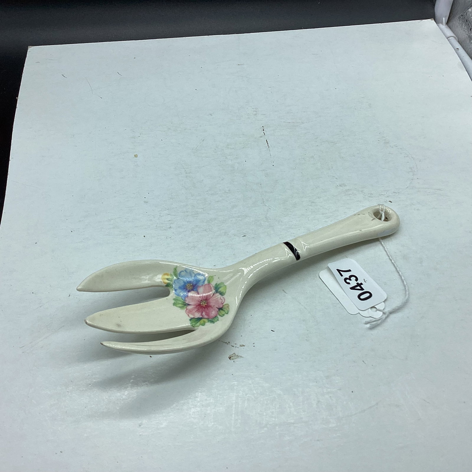 PORECLIAN SERVING FORK: 8 1/4" LONG GOOD SHAPE