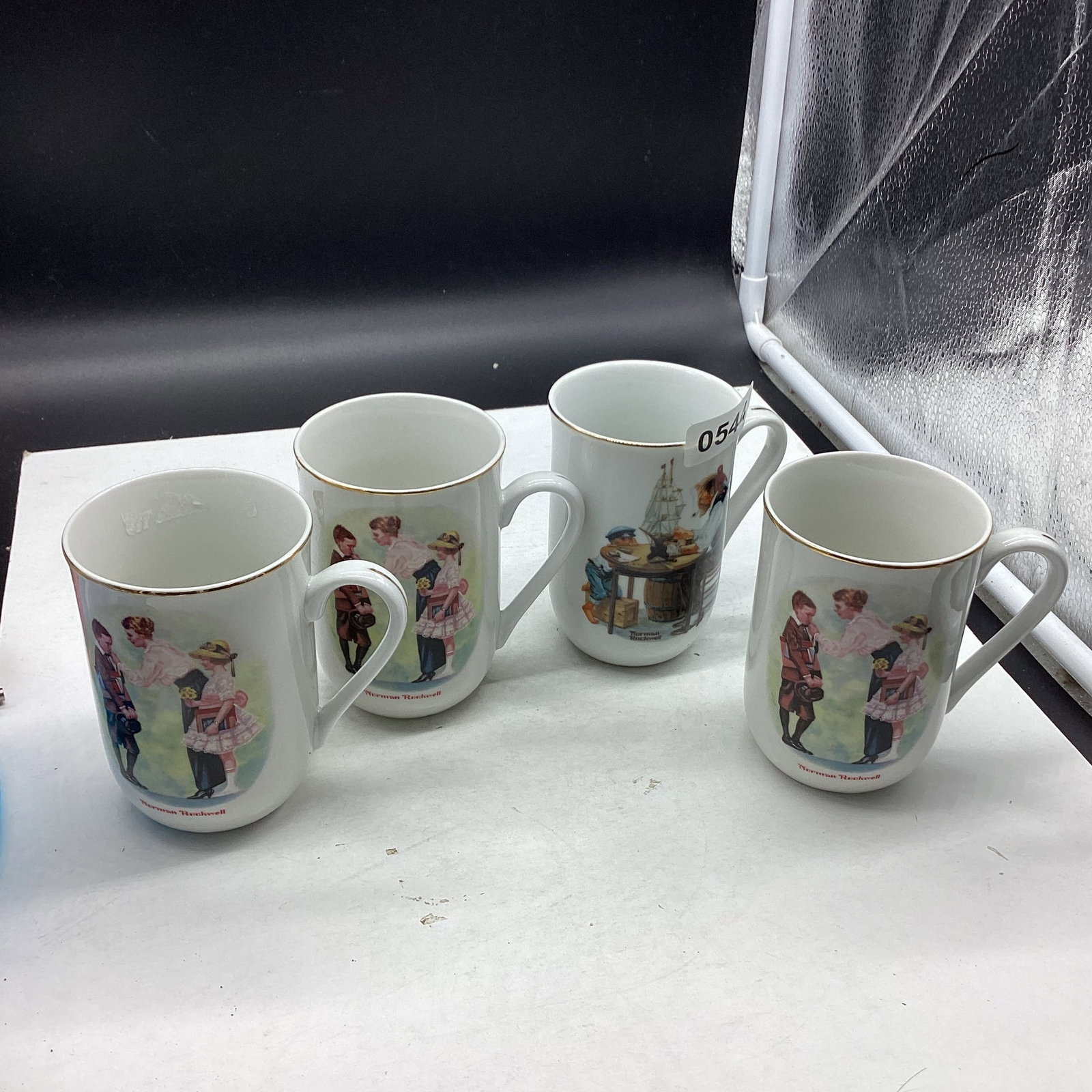4 NORMAN ROCKWELL MUGS: 4" TALL GOOD SHAPE