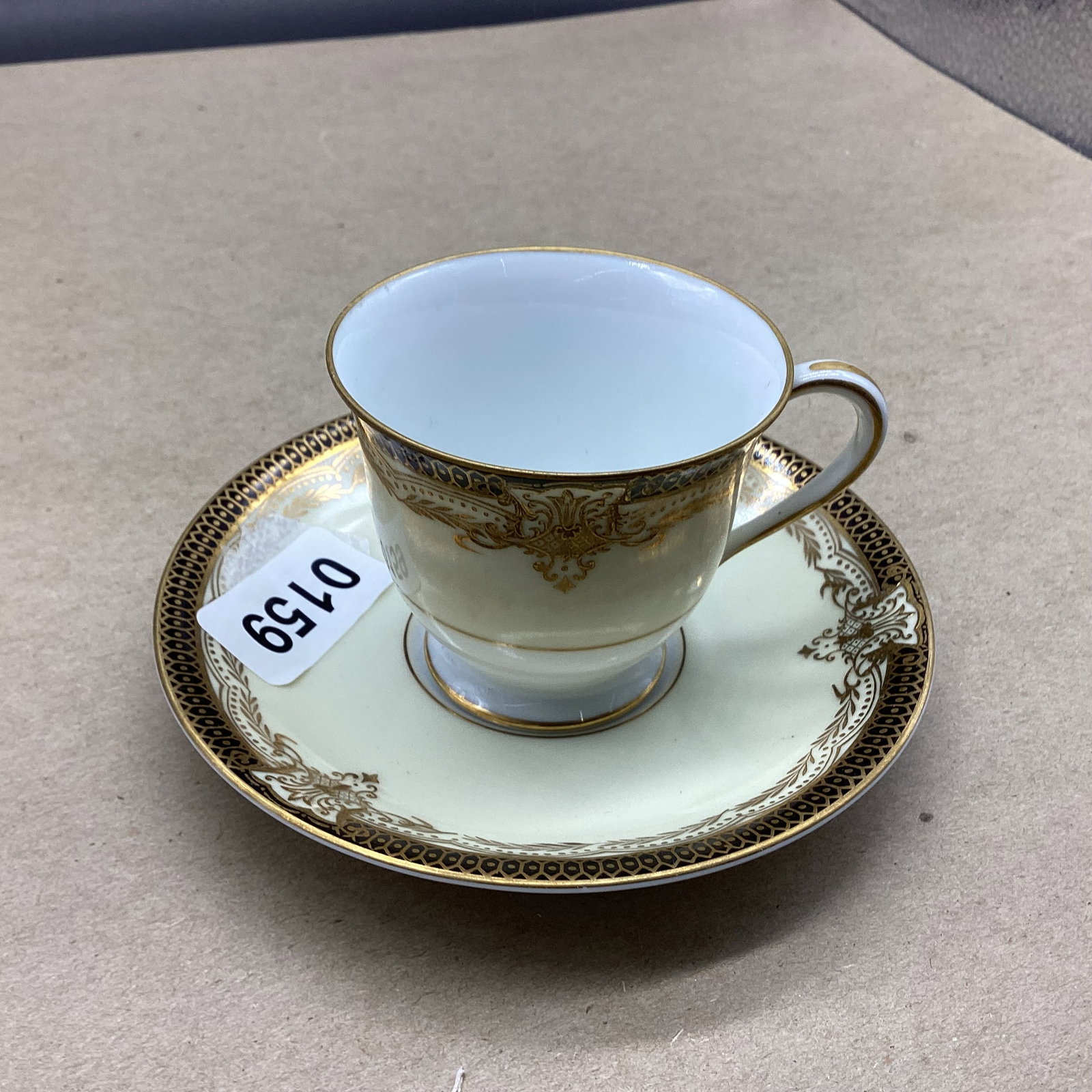 PORCELIAN DEMITASSIE CUP & SAUCER JAPAN (1 of 2)