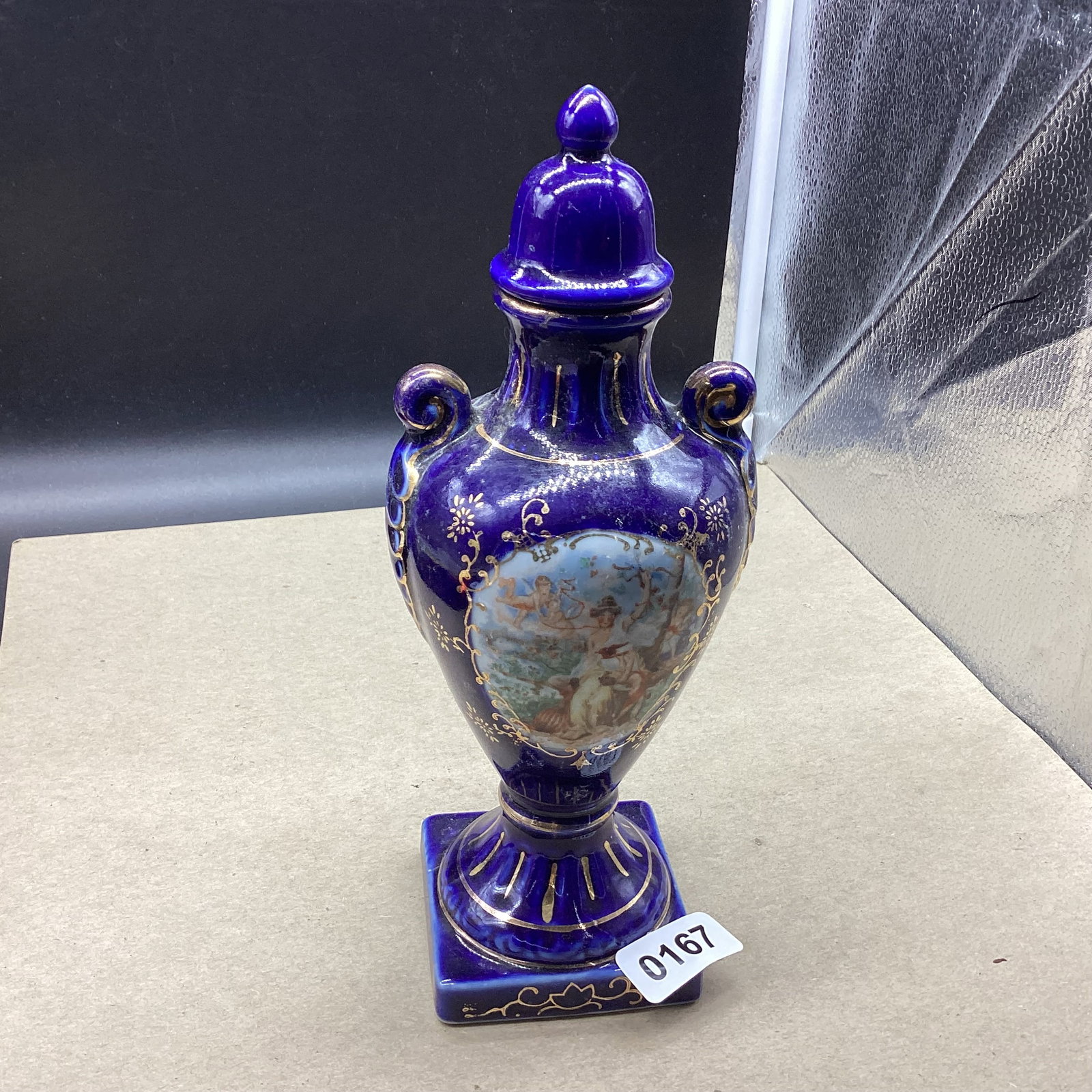 BLUE PORCELIAN URN HAND PAINTED GOLD TRIM: 10 1/4" TALL GOOD SHAPE