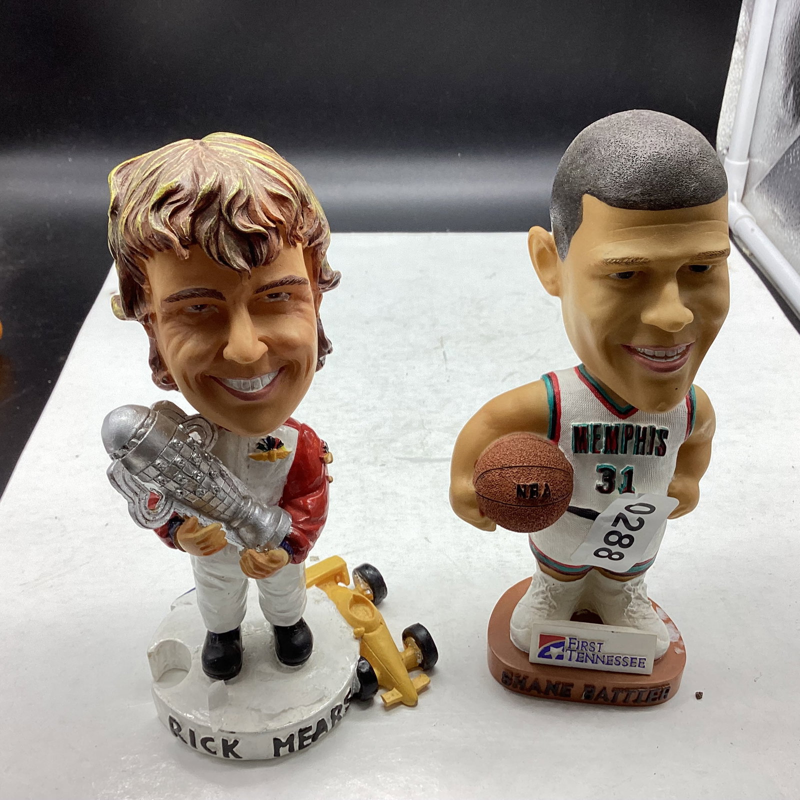 2 BOBBLE HEAD FIGURINES: 7 1/4" TALL GOOD SHAPE