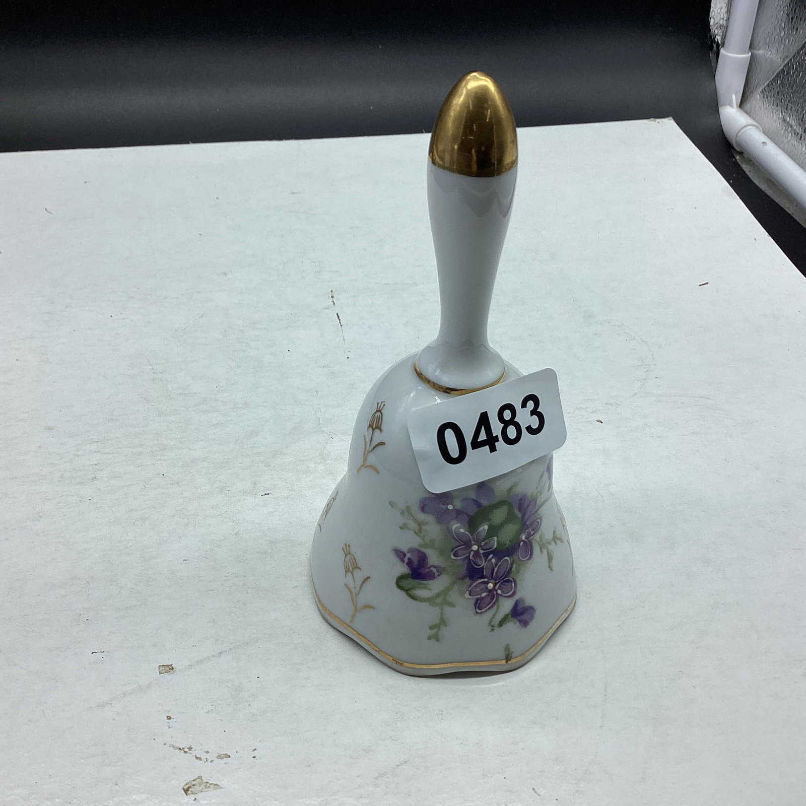 PORCELIAN HAND PAINTED BLUE VIOLETS BELL: 6 1/2" TALL GOOD SHAPE
