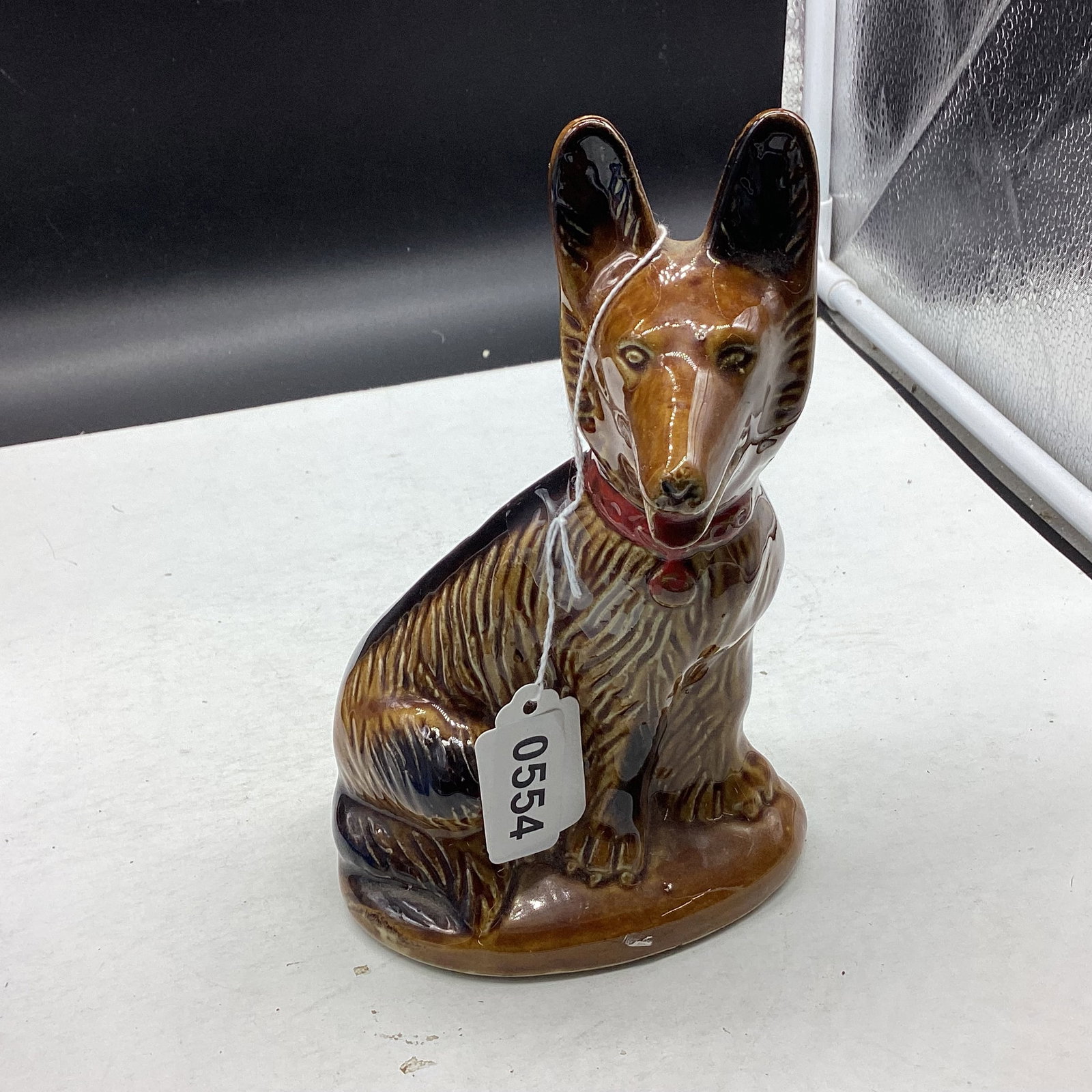 PORCELIAN DOG FIGURINE: 8" TALL GOOD SHAPE