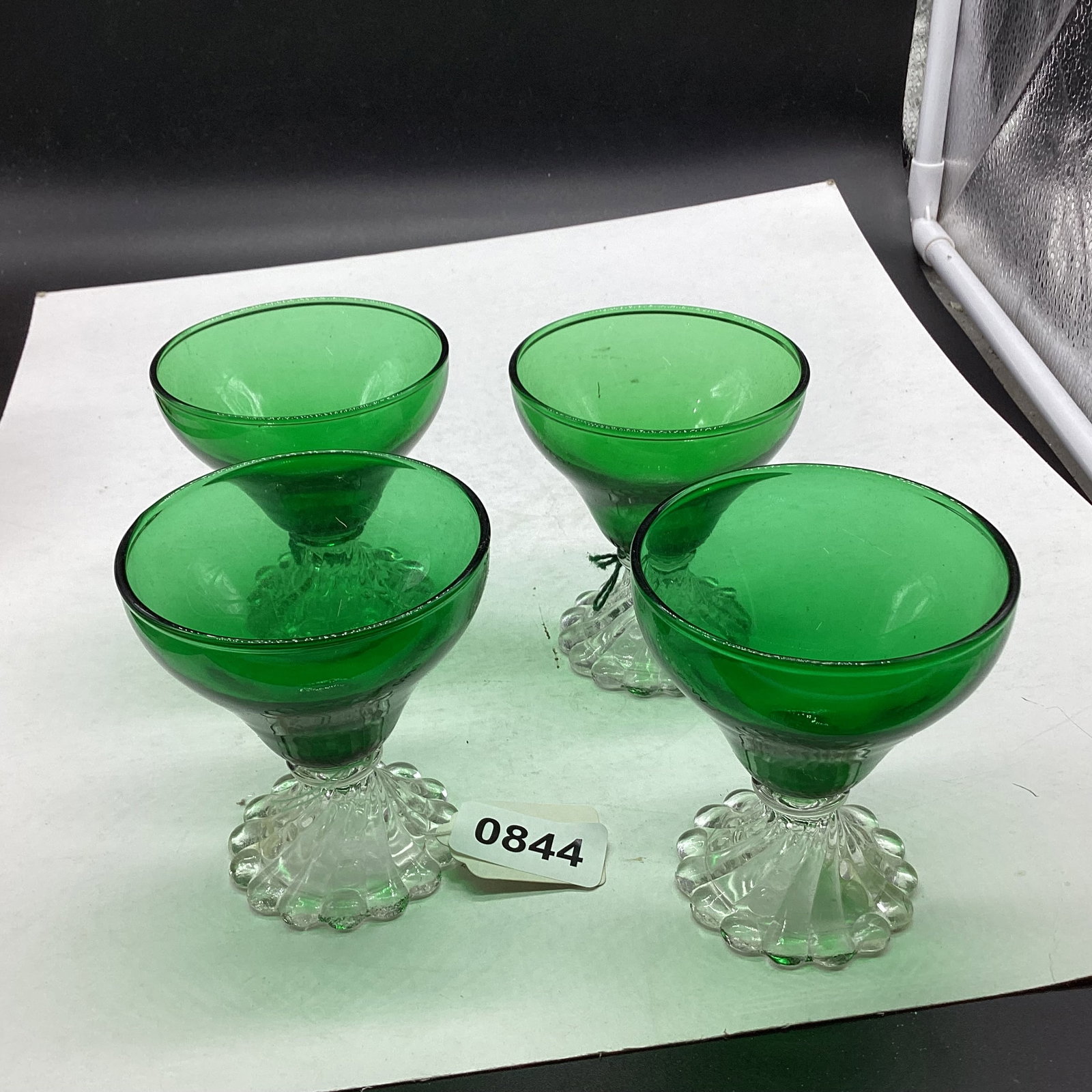 4 DEPRESSION FOREST GREEN COCKTAILS W/BURPLE FEET: 3 3/4" TALL GOOD SHAPE