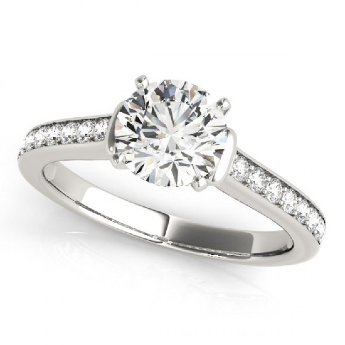 1.50 CTW VS/SI Diamond Solitaire Ring 18K White Gold: 1.50 CTW VS/SI Diamond Solitaire Ring 18K White Gold ---- Manufacturer's Suggested Retail Price: $19100 Item: Diamond Ring Total Gem weight: 1.5 carats Metal: Solid 18k White Gold Jewelry Note: Ring S