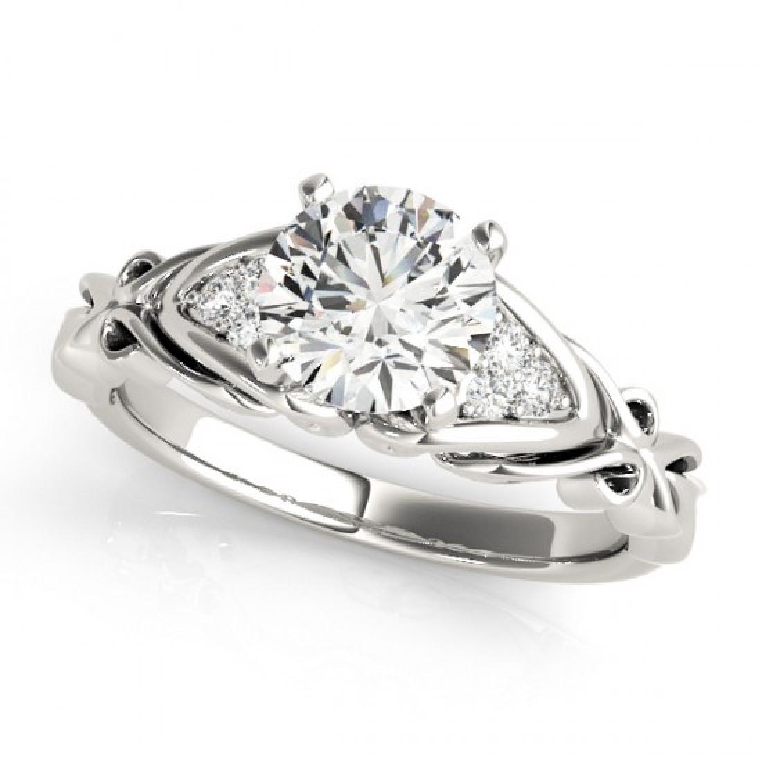 0.85 CTW VS/SI Diamond Solitaire Ring 18K White Gold: 0.85 CTW VS/SI Diamond Solitaire Ring 18K White Gold ---- Manufacturer's Suggested Retail Price: $11050 Item: Diamond Ring Total Gem weight: 0.85 carats Metal: Solid 18k White Gold Jewelry Note: Ring 