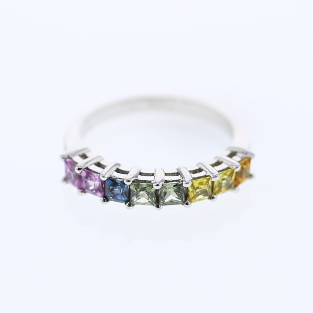 Multi Colored Sapphire Band in 14K White Gold: Item#-27F9Y ------ Multi Colored Sapphire Band in 14K White Gold Mainstone Type: 8 Rainbow Sapphire @ 1.29 ct Mainstone Color: Multi-Color Mainstone Clarity: Translucent Metal Type: 18K White Gold @ 3