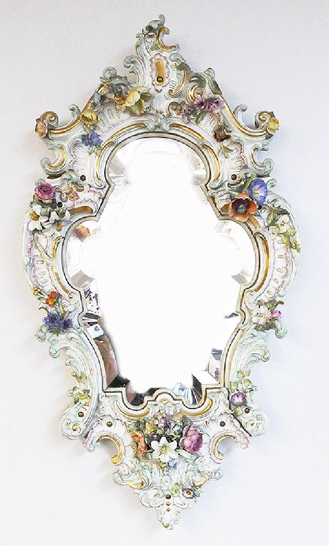 19C Meissen or Dresden Floral Wall Mirror: Fine handpainted porcelain wall mirror with heavy, beveled, fancy shape glass in excellent condition, no silver losses. Most likely Meissen, KPM or Dresden, but no apparent hallmark. A couple of nicke